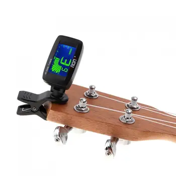 Universalus Clip-on Guitar Tuner Trijų Spalvų LCD Apšvietimas su Moneta Baterija Chromatines / Gitara / Bass / Smuikas / Ukulėle
